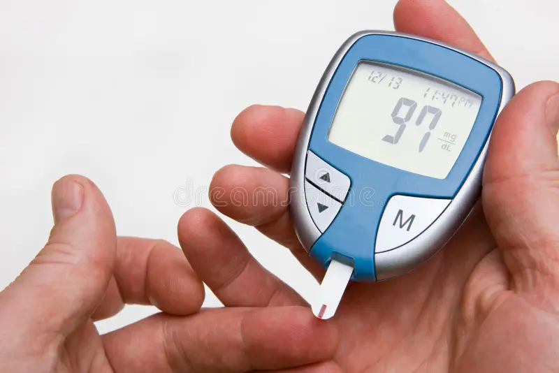 Blood glucose meter reading 97 mg/dL